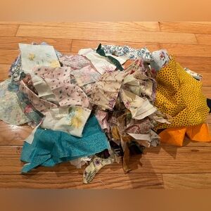 Assorted fabric pieces—strips and remnants